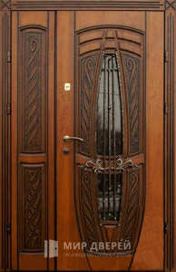 Уличная дверь для дома с ковкой №106 внешняя - фото